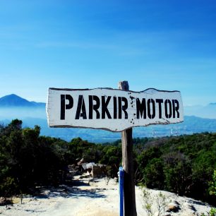 1090992 - signage on the top of mt tangkuban perahu taken in bandung indonesia (parkir motor in indonesia mean motocycle parking)